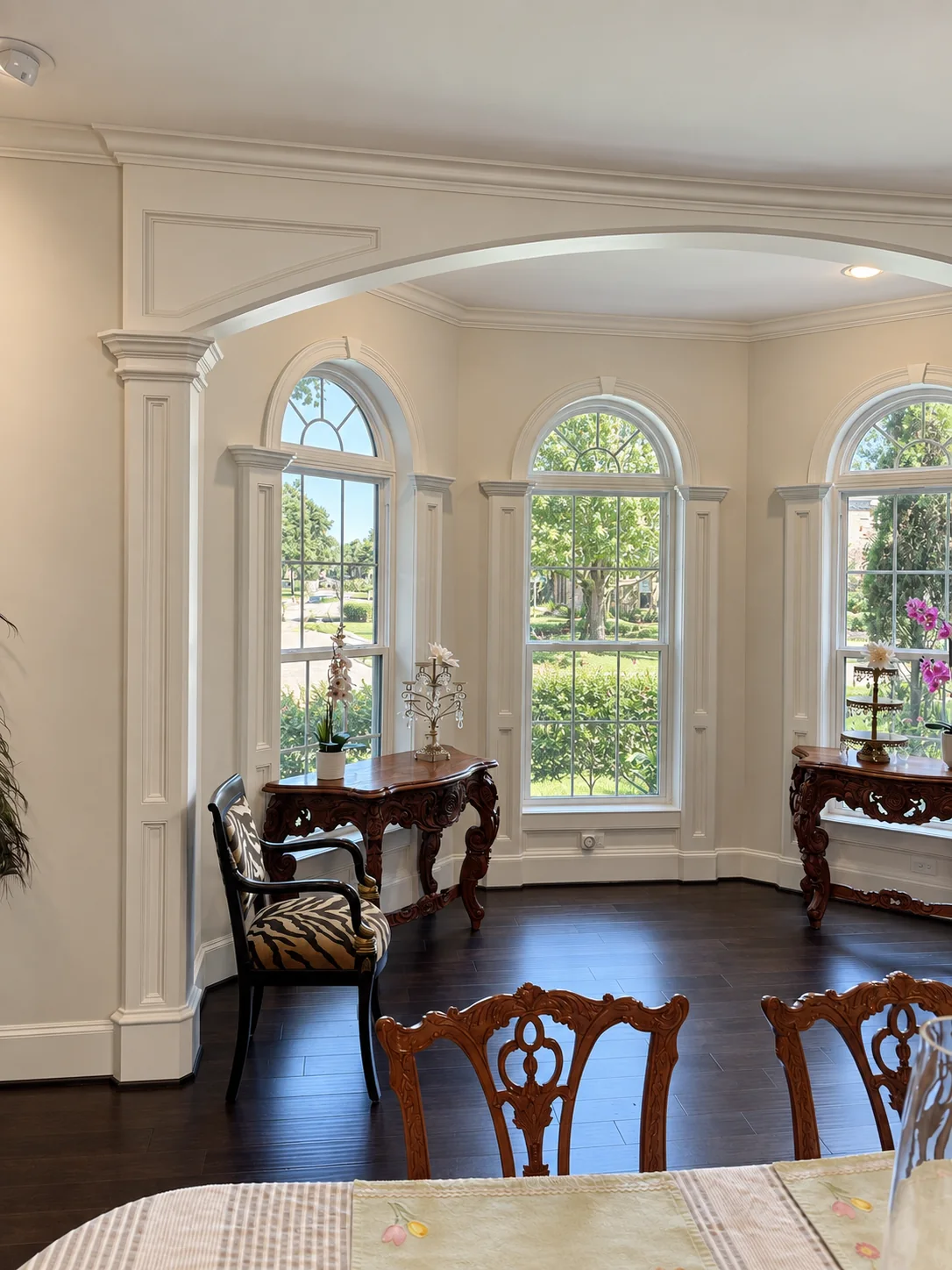 Arched windows and interior trim in a dining room