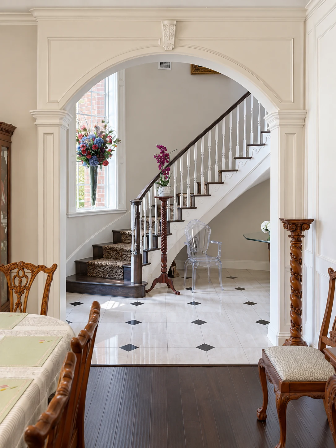Interior arch opening toward an entry stair